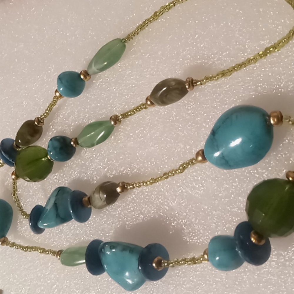 Vintage 34 inches long larg beaded necklace.